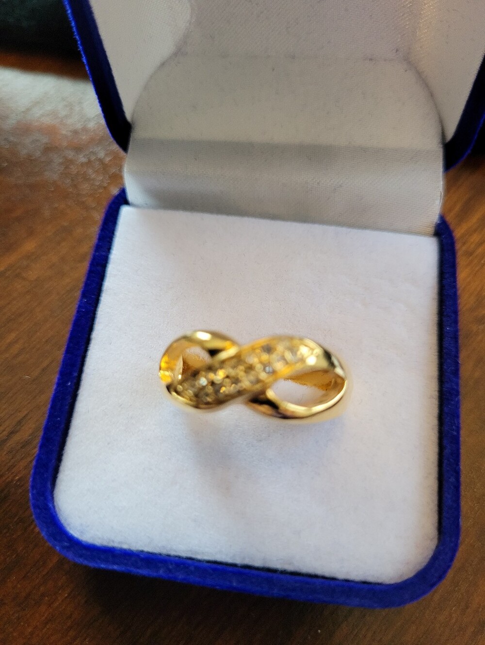 Premier Designs Gold Tone Knot Ring with CZs.